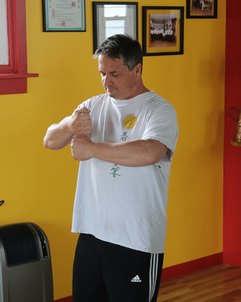 Sifu Pete Scheers doing chi kung exercise